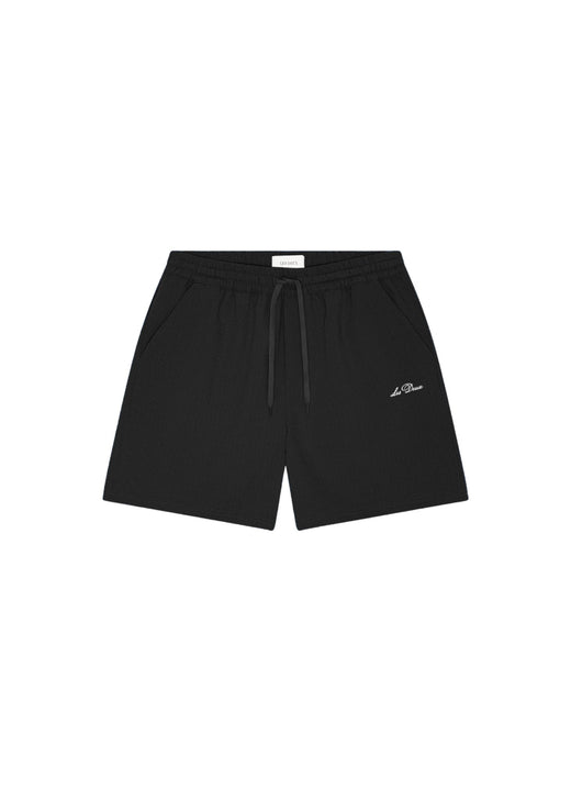 Les Deux Seersucker Swim Shorts in Tap Shoe Black - front flat lay